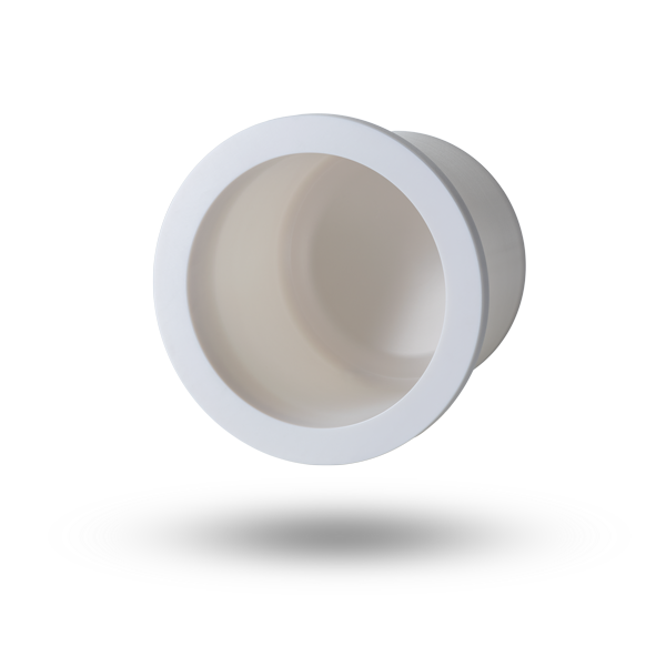 A white, cylindrical cotainment shell made of ceramic, depicted against a white background.