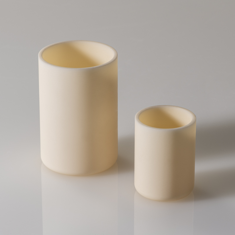 2 beige Tiegel in Zylinderform